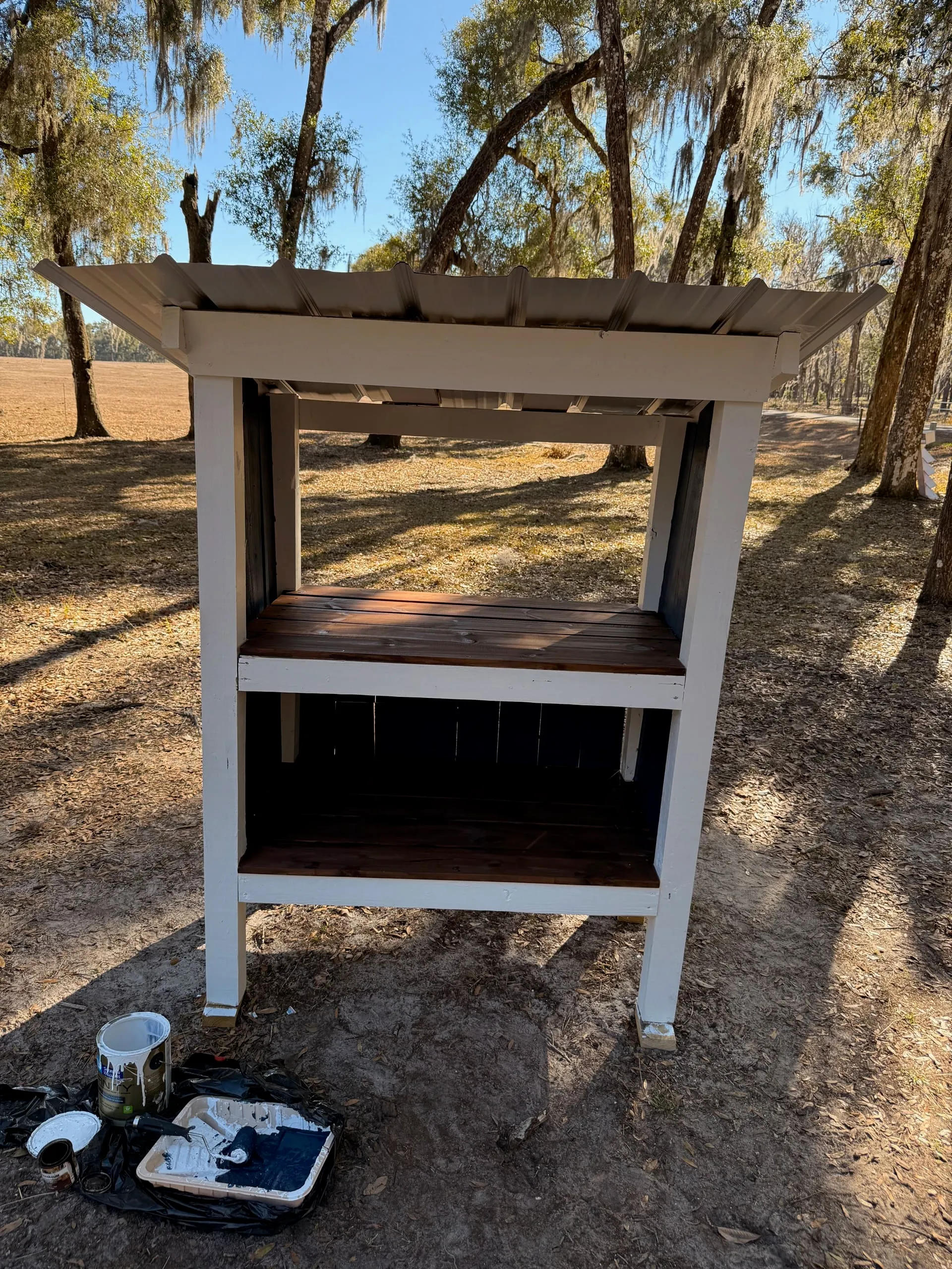 adding trim and siding to the farmstand